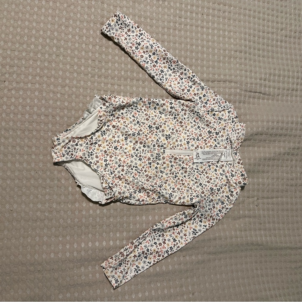 Floral swimsuit with long sleeve rash guard